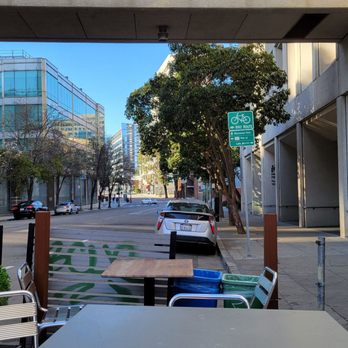 Falafel Boy - Sitting at the large table in its parklet. - Falafel Near Me - Oakland, California