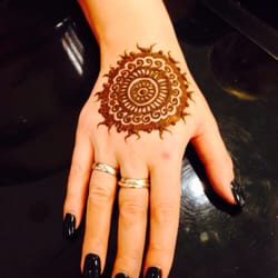 Precise Brows Threading Salon - Elegant henna design