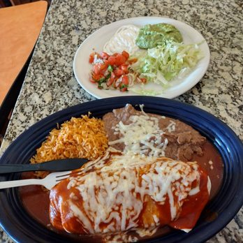 Taqueria Los Caporales - El Padre Burrito with touch of Enchilada sauce (wet style) - Mexican Near Me - Livermore, California Taqueria Los Caporales - El Padre Burrito with touch of Enchilada sauce (wet style) - Mexican Near Me - Livermore, California