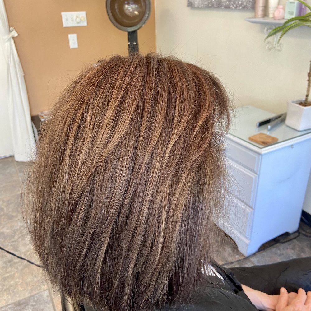 Inka is a master hair colorist, she put highlights in my hair, transforming the color from harsh black to soft chocolate...she's the best!