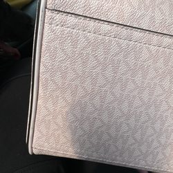 Michael Kors - When I asked for another newer bag she brought out a whole new bag like a new style a new color, a bag I didn't ask for .