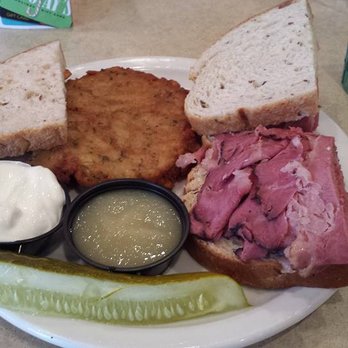 TooJay’s Deli * Bakery * Restaurant - Pastrami on rye with a potato pancake- sour cream, apple sauce and a pickle - Caterers Near Me - Ocoee, Florida