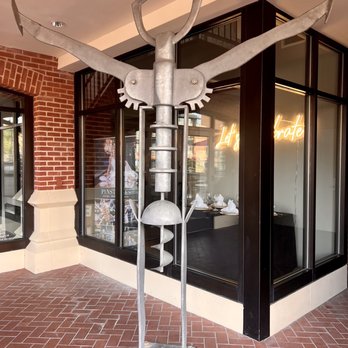 Pinstripes - a metal sculpture of a bird on a pole - Venues & Event Spaces Near Me - Washington, DC, District of Columbia