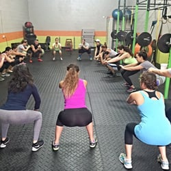 Legendary Fitness - Evening class worming up for leg day.