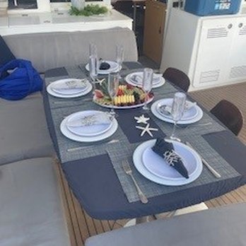Riviera Maya Catamarans - table - Boat Charters Near Me