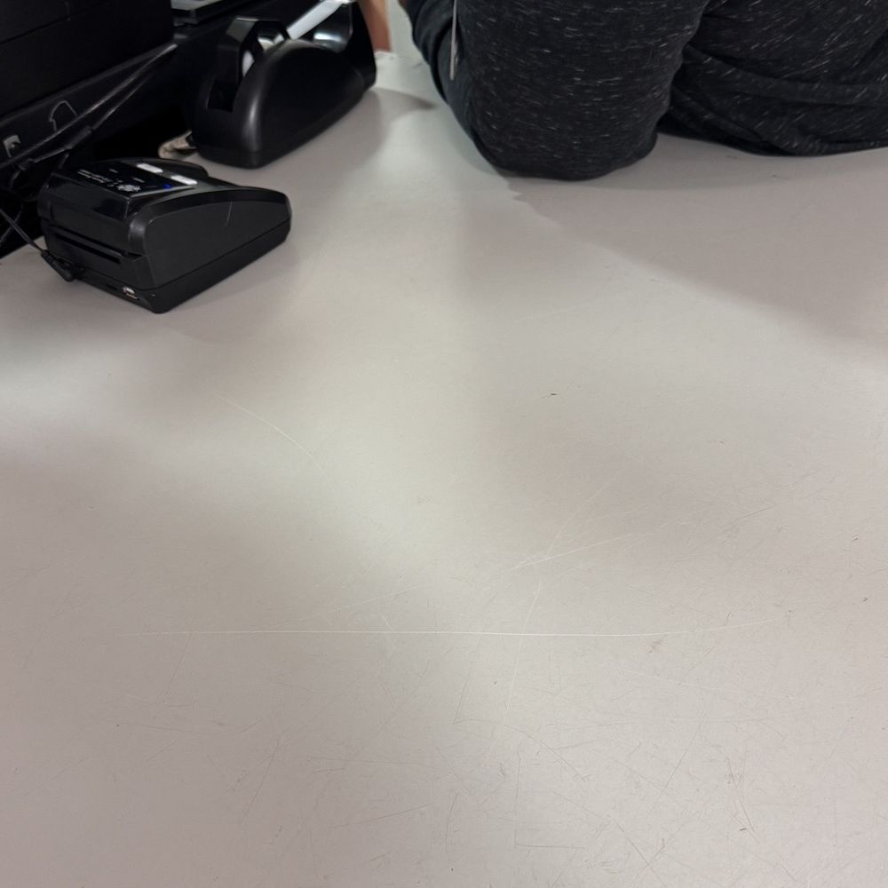 Had her shoulder turned and checking her phone. Customers must be a bother to her.