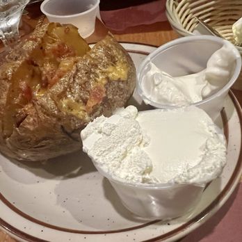 Treasure Island Supper Club - Loaded baked potato - Supper Clubs Near Me - Dayton, Ohio Treasure Island Supper Club - Loaded baked potato - Supper Clubs Near Me - Dayton, Ohio