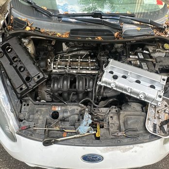 Rust Belt - valve cover, valve cover gasket and spark plugs being replaced on a 2016 ford fiesta - Auto Repair Near Me