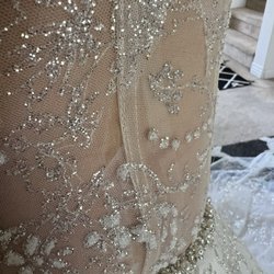 Fantasy Bridal - Dress lace looks ripped