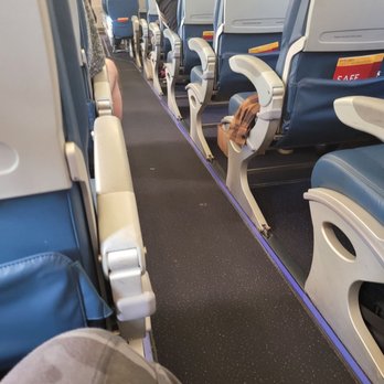 Delta Airlines - Someone sat in my seat. I told her she was in my seat, but I didn't fuss because I didn't want to wait to sanitize - Airlines Near Me - Sacramento, California