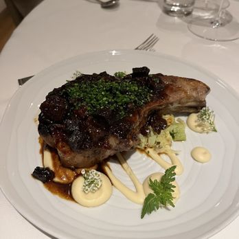 Oak Park - Candied bacon pork chop - New American Near Me - Des Moines, Iowa Oak Park - Candied bacon pork chop - New American Near Me - Des Moines, Iowa