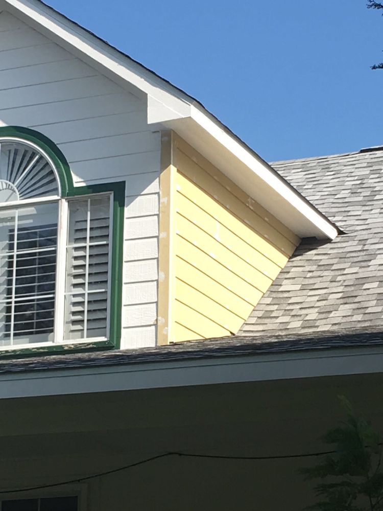 Slide of Champ Vision Roofing Services