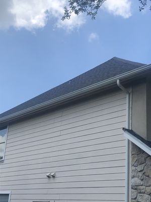 Quality Roofing And Contracting Logo