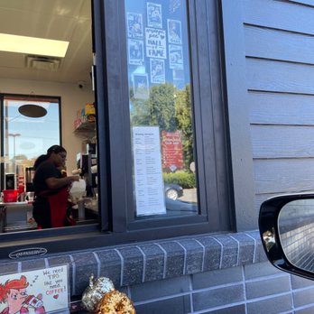 Scooter's Coffee - reflection of a woman in the window - Coffee & Tea Near Me - Indian Trail, North Carolina Scooter's Coffee - reflection of a woman in the window - Coffee & Tea Near Me - Indian Trail, North Carolina