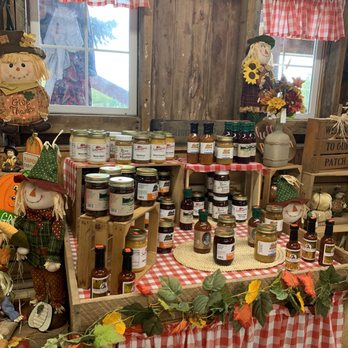 Schwallier's Country Basket - a table with jars of jams - Farmers Market Near Me - Sparta, Michigan