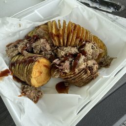 Spiral potato with bbq and pork. Spiral potato with bbq and pork.