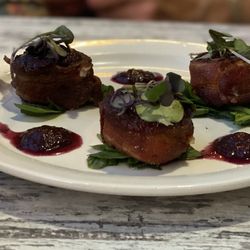 LakeHouse Restaurant - Bacon wrapped scallops with a blueberry reduction for an appetizer. Delicious.