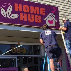 FASTSIGNS - Petaluma - Chad and Brett, of our sister company, Peace Out Junk Hauling, installing our awesome new roof sign!
