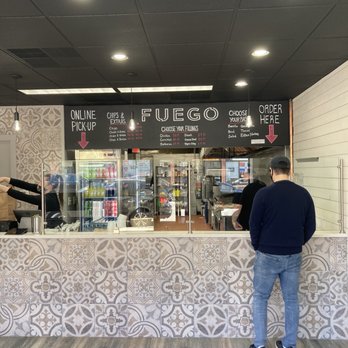 Fuego - Counter to pick your toppings! - Mexican Near Me - Norwood, Massachusetts