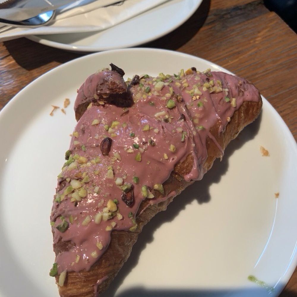 Ulrich - Ruby chocolate croissant with pistachios and pomegranate. - Cafes Near Me - Vienna, 9 Ulrich - Ruby chocolate croissant with pistachios and pomegranate. - Cafes Near Me - Vienna, 9
