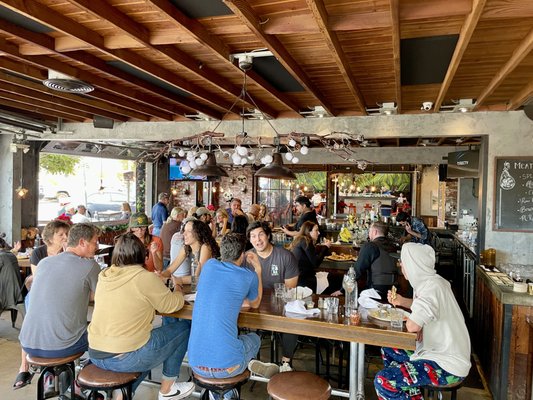 Photo of Luce Bar & Kitchen - San Diego, CA, US. Looking into the restaurant.