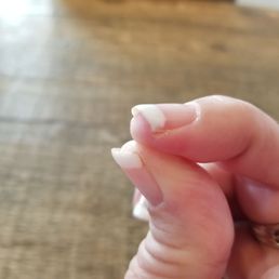 The white does not even cover the entire nail.