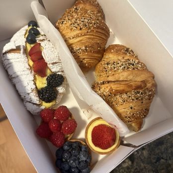 Le Saint Honore - A few mini berry tarts,  croissant boteau and savory ham and Swiss croissants. So good! - Bakeries Near Me - Dana Point, California