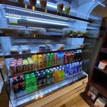 Café Amico - a refrigerated display case filled with drinks - Coffee & Tea Near Me - Duluth, Georgia Café Amico - a refrigerated display case filled with drinks - Coffee & Tea Near Me - Duluth, Georgia