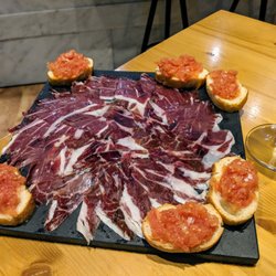 Syrah - Jamón ibérico de bellota. The best quality level you can get. It's so buttery, melting on your tongue and not salty at all!