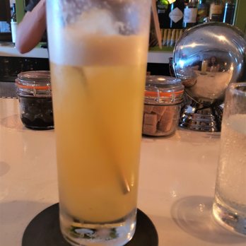 Last Saint - Cocktail customized by the bartender that was similar to Ginger # 3 and included mezcal, ginger, more pineapple, and soda water - Bars Near Me - Charleston, South Carolina