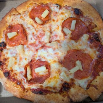 The Upland Pizza Company - Worst pizza I've got from this place. Hardly any toppings ($2 each!) misshapen, sliced terribly - Pizza Near Me - Upland, California