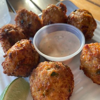Pepper's Bar & Grill - Conch fritters - Bars Near Me - George Town, UM