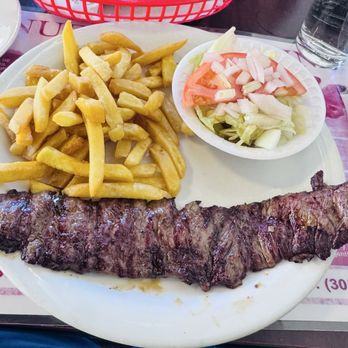 La Nueva Argentina - Steak, Fries & Salad Plate A hearty Argentine lunch tender steak, crispy fries, and a fresh salad. - Latin American Near Me - Miami, Florida