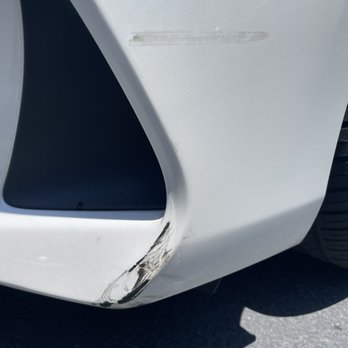 Bumper Buddies - Before picture - front left bumper damage due to a tire/hubcap scrape. - Body Shops Near Me - Anaheim, California Bumper Buddies - Before picture - front left bumper damage due to a tire/hubcap scrape. - Body Shops Near Me - Anaheim, California