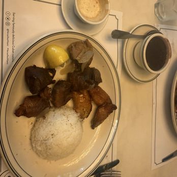 Versailles - Fried pork chunks with a cortadito - Cuban Near Me - Miami, Florida Versailles - Fried pork chunks with a cortadito - Cuban Near Me - Miami, Florida