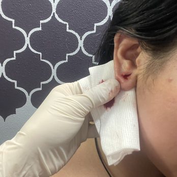 L & G Tattoos - Here I am at the professional piercer and they did an amazing job with taking out the 00g gauge - Tattoo Near Me - Los Angeles, California