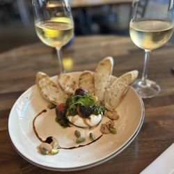 Urban Grill and Wine Bar - McKinney - Burrata with pesto, roasted tomatoes and pistachios.