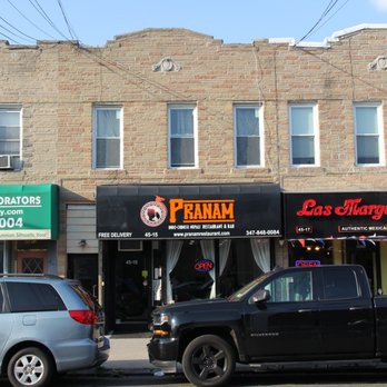 Pranam Restaurant & Bar - cars parked on the street - Indian Near Me - Astoria, New York Pranam Restaurant & Bar - cars parked on the street - Indian Near Me - Astoria, New York