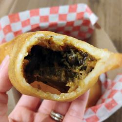 Teque Pancho - Inside the Pabellon corn empanada $5.50.
