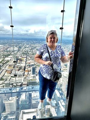 Photo of Willis Tower - Chicago, IL, US. I was too afraid to step all the was back to the outer wall. Others were posing and having a blast. I'd do it again!