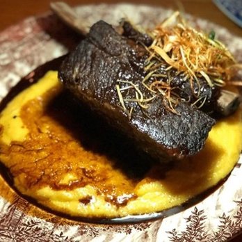 San Fermo - Short Ribs - saffron polenta, cinnamon, cloves, fried leeks, Demi glacé - Italian Near Me - Seattle, Washington San Fermo - Short Ribs - saffron polenta, cinnamon, cloves, fried leeks, Demi glacé - Italian Near Me - Seattle, Washington