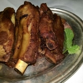 Mr Chow - Pork, tasted triple fried and no seasoning. I used the house made hot sauce  wow - Chinese Near Me - Beverly Hills, California