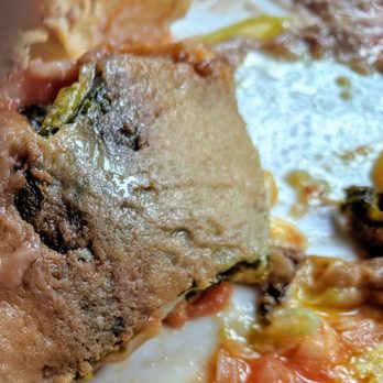 La Casita Olvera - Underside chile relleno not fresh turning brown black spots previously cooked food held too long. - Mexican Near Me - Whittier, California