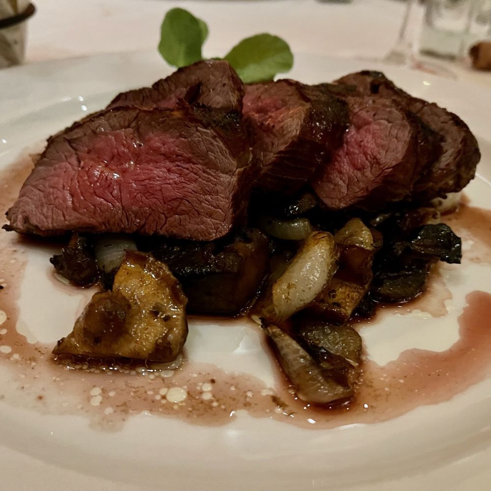 The Capital Grille - Sliced Filet Mignon with Cipollini Onions, Wild Mushrooms and Fig Essence - Steakhouses Near Me - Louisville, Kentucky The Capital Grille - Sliced Filet Mignon with Cipollini Onions, Wild Mushrooms and Fig Essence - Steakhouses Near Me - Louisville, Kentucky
