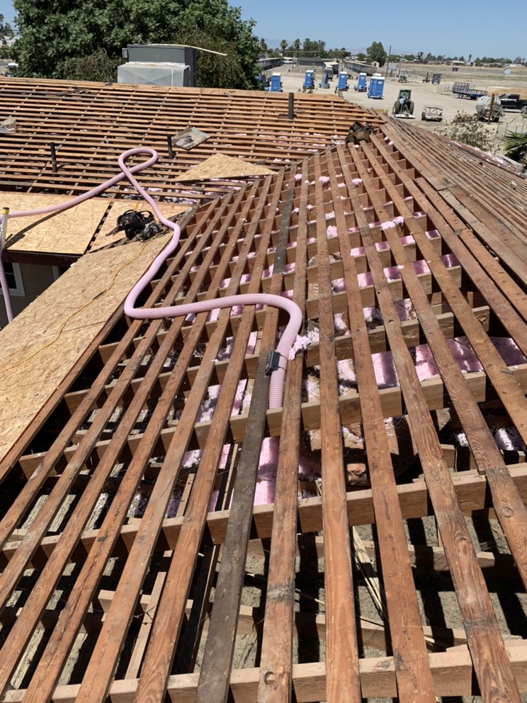 Slide of JAG Roofing