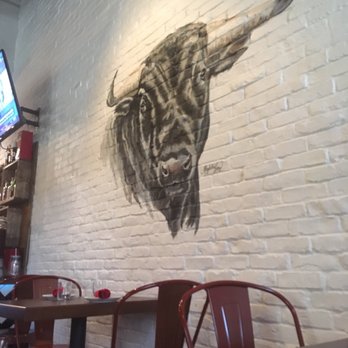 Toro Kitchen + Bar - Wall art - Tapas Bars Near Me - San Antonio, Texas Toro Kitchen + Bar - Wall art - Tapas Bars Near Me - San Antonio, Texas