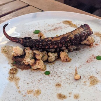 Violet - Grilled Spanish Octopus, Date and Caper Puree, Cauliflower, Indian Caper Salt - New American Near Me - Seattle, Washington