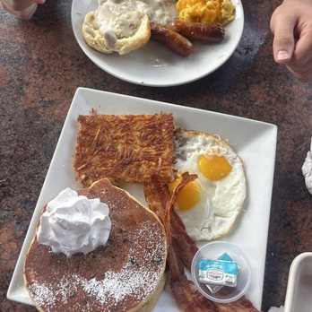 White Wolf Cafe - Gluten-free chocolate chip pancakes and biscuits and gravy - New American Near Me - Orlando, Florida White Wolf Cafe - Gluten-free chocolate chip pancakes and biscuits and gravy - New American Near Me - Orlando, Florida