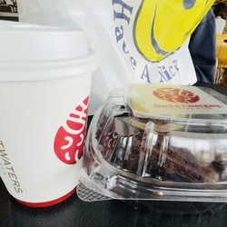 Sweetwaters Coffee & Tea - Caramel macchiato and slice of OMG chocolate cake