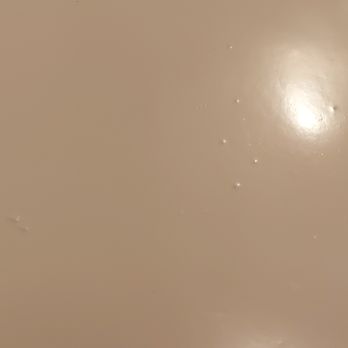 Vito Remodeling and Refinishing - The little divots - that is clearly "the tub", but the globs under the new finish are a bit careless. - Refinishing Services Near Me - Riverside, Illinois